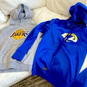 Lakers hoodie sweater worn twice .  Rams brand new .Sold separately